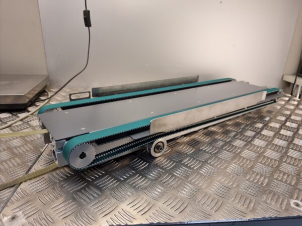 10-193.jpg Toothed belt conveyor lenght 99cm, width 23cm