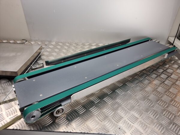10-196.jpg Toothed belt conveyor lenght 99cm, width 23cm