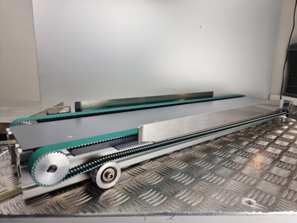 10-197.jpg Toothed belt conveyor lenght 99cm, width 23cm