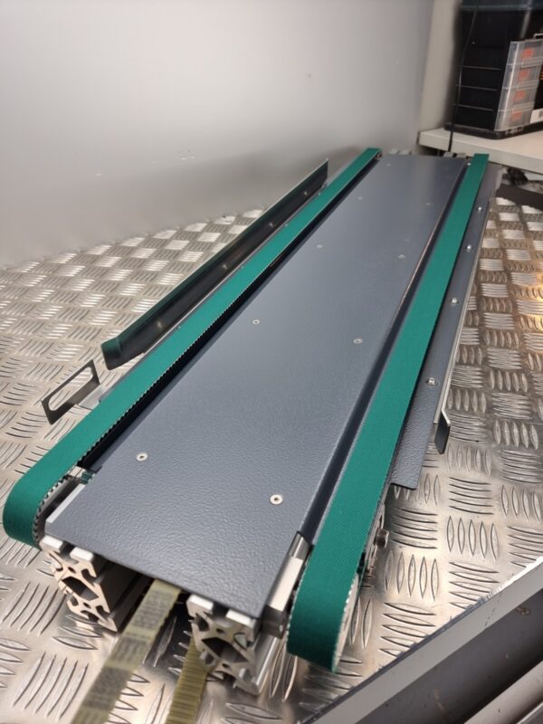 10-198.jpg Toothed belt conveyor lenght 99cm, width 23cm