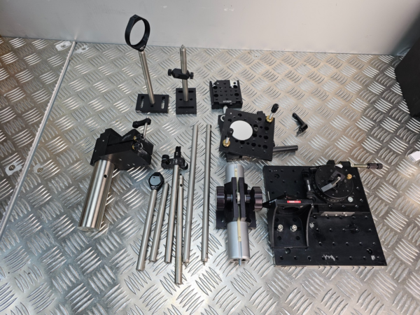 10-93.png Thorlabs Newport Optical Bench Setup Lot – Stages, Mounts, Posts, Mirror Holder