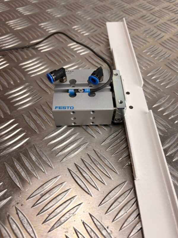 10-50.jpg FESTO DFM-12-25-P-A-GF Pneumatic Guided Cylinder w/ SICK Sensor
